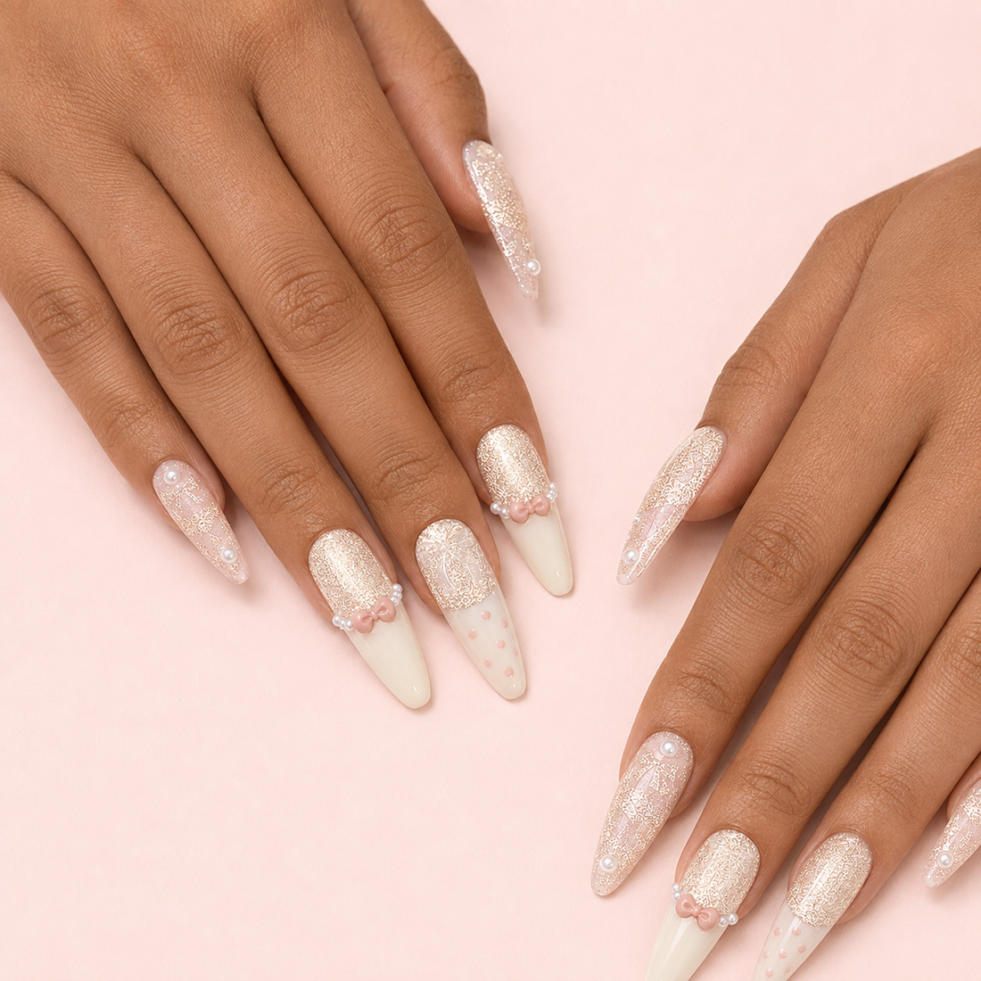 Two hands side by side wearing Ribbon Souffle Long Stiletto blush French press-on nails