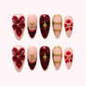 Crimson Keepsake medium almond wine-red floral press-on nails with gold accents