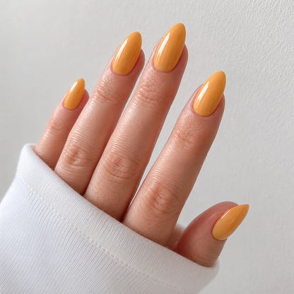 Apricot Hour medium almond yellow press-on nails by Matchy Nails