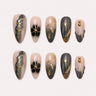 Astral Petal charcoal blush and gold medium almond press-on nails product display