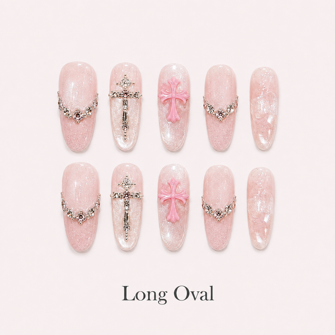Blush Benediction Long Oval handmade press-on nails with blush cat-eye shimmer, chains and crystal crosses