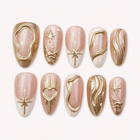 Champagne Zodiac gold chrome medium almond press-on nails on a pale blush background