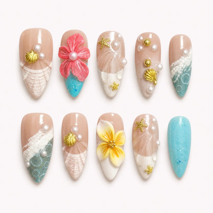 Coral Cabana medium almond tropical press-on nails with turquoise waves flowers shells and pearls