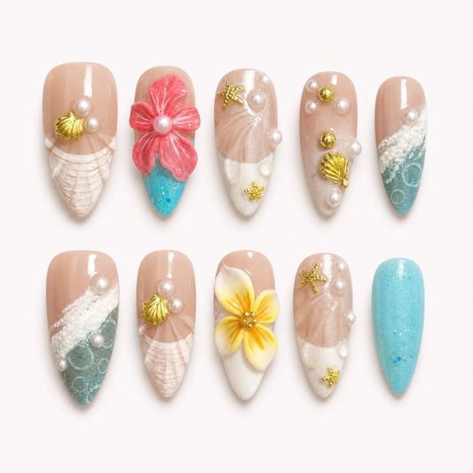 Coral Cabana medium almond tropical press-on nails with turquoise waves flowers shells and pearls