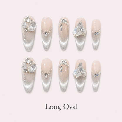 Diamond Haze Long Oval handmade press-on nails with nude silver cat-eye shimmer and crystals