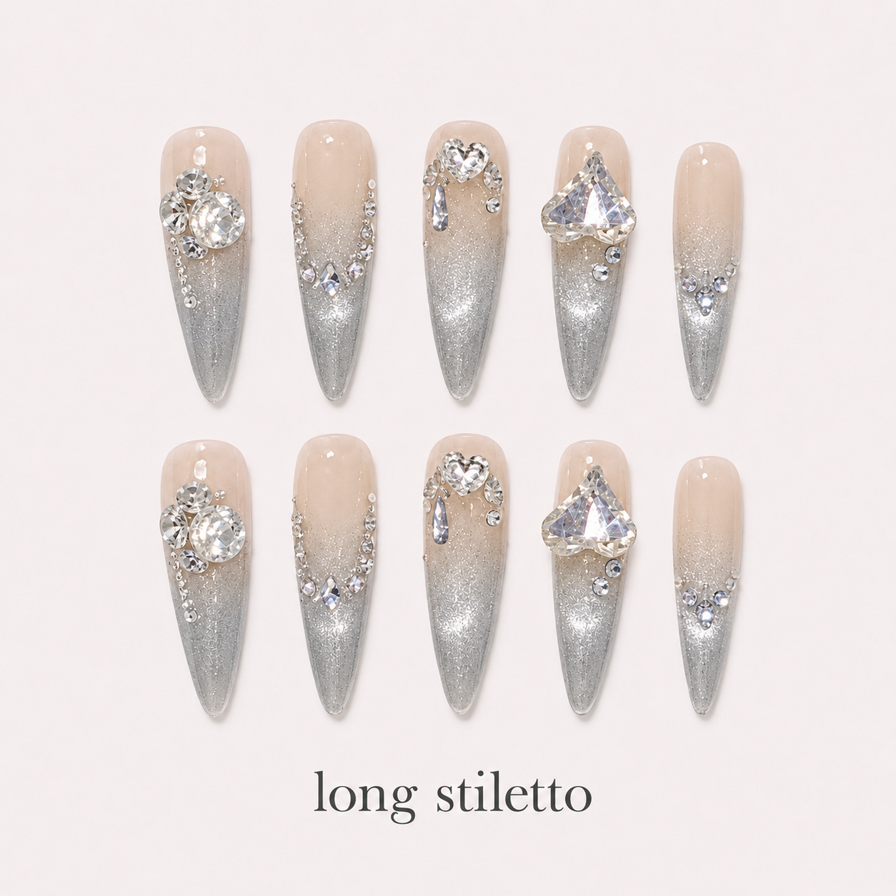 Diamond Haze Long Stiletto handmade press-on nails with nude silver cat-eye shimmer and crystals