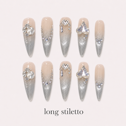 Diamond Haze Long Stiletto handmade press-on nails with nude silver cat-eye shimmer and crystals