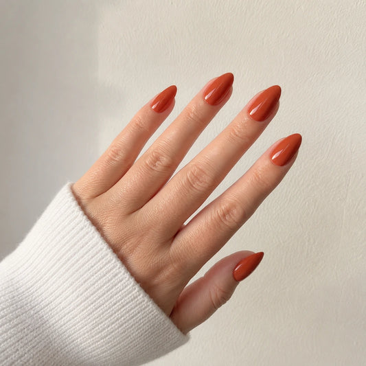 Ember Silk medium almond orange press-on nails by Matchy Nails