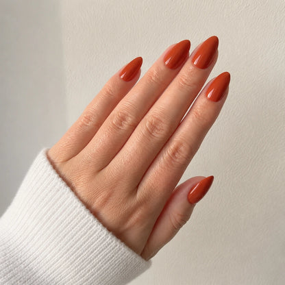 Ember Silk medium almond orange press-on nails by Matchy Nails