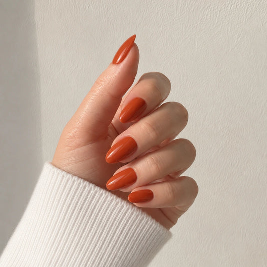 Ember Silk medium almond orange press-on nails by Matchy Nails