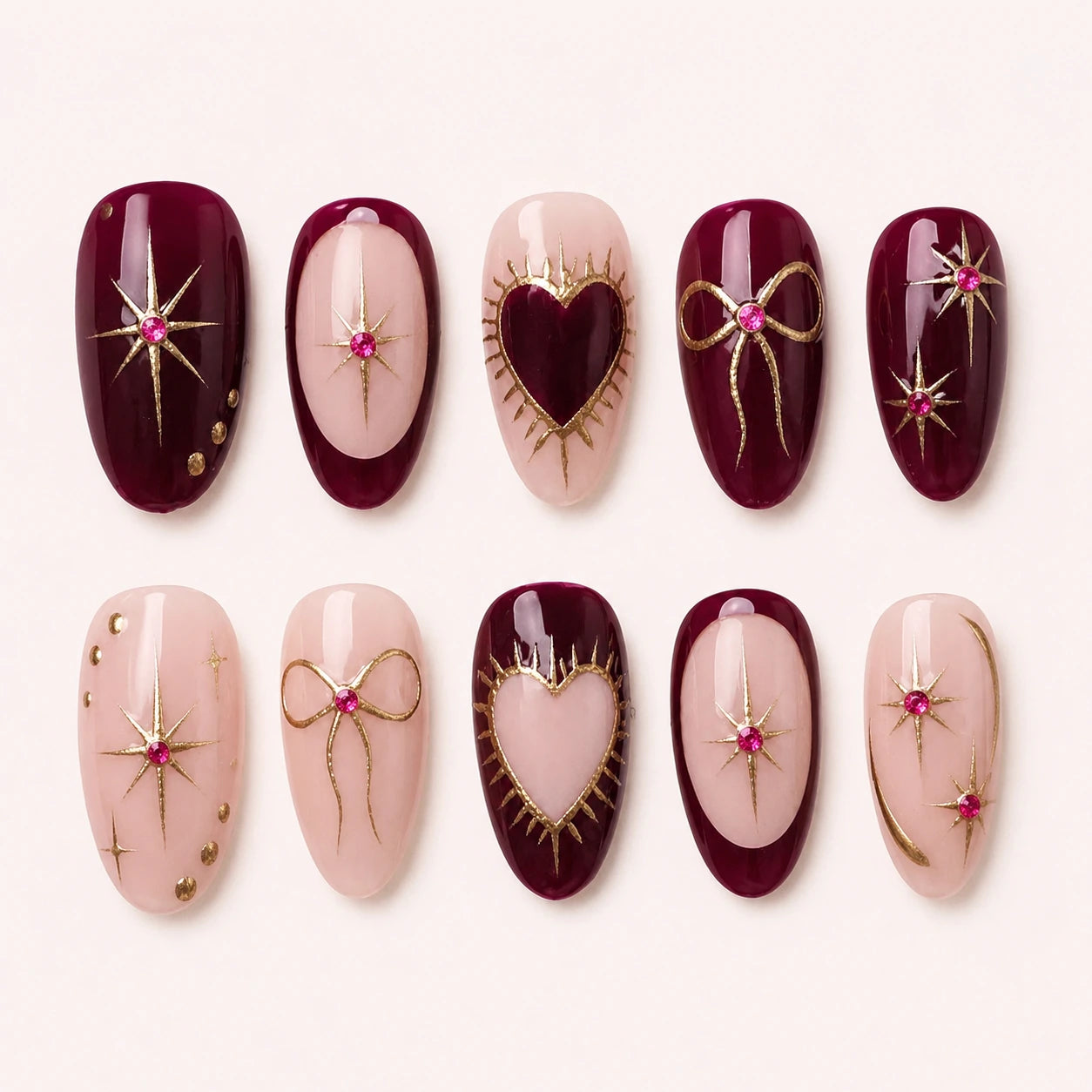 Garnet Wish burgundy blush and gold oval press-on nails product display