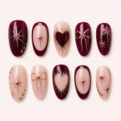 Garnet Wish burgundy blush and gold oval press-on nails product display
