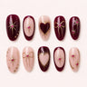 Garnet Wish burgundy blush and gold oval press-on nails product display