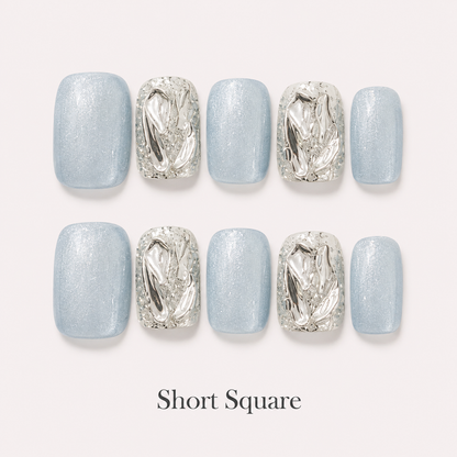 Glacier Prism Short Square handmade press-on nails in icy blue with silver mirrored crystal accents