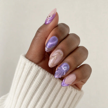 Lavender Grotto purple shell press-on manicure on one medium-brown hand
