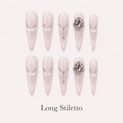 Lustre Locket Long Stiletto handmade press-on nails with blush cat-eye shimmer, chains and smoky jewels