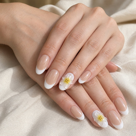 Daisy Milk press-on nails shown on light-skinned two hands