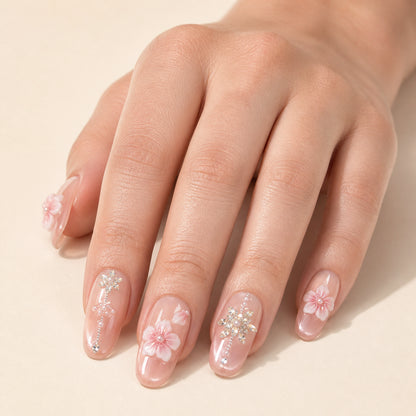 Petal Chandelier press-on nails shown on light-skinned one hand