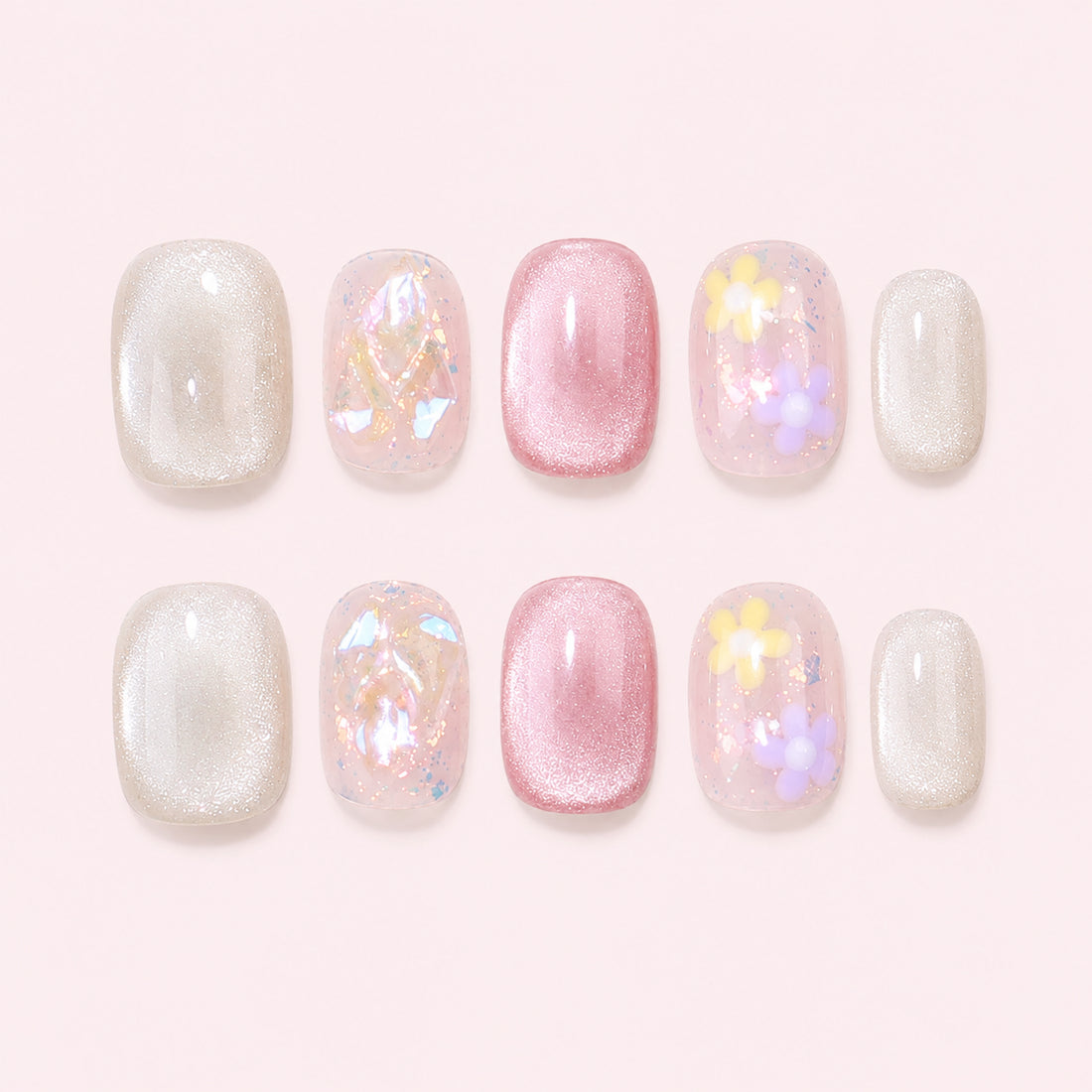 Petal Sprinkles is a handmade iridescent glossy short squoval press-on nail set in pink, white, clear, yellow, purple, featuring small flowers, shimmer and iridescent fragments, flat lay