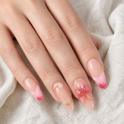 Rose Drift press-on nails shown on light-skinned one hand