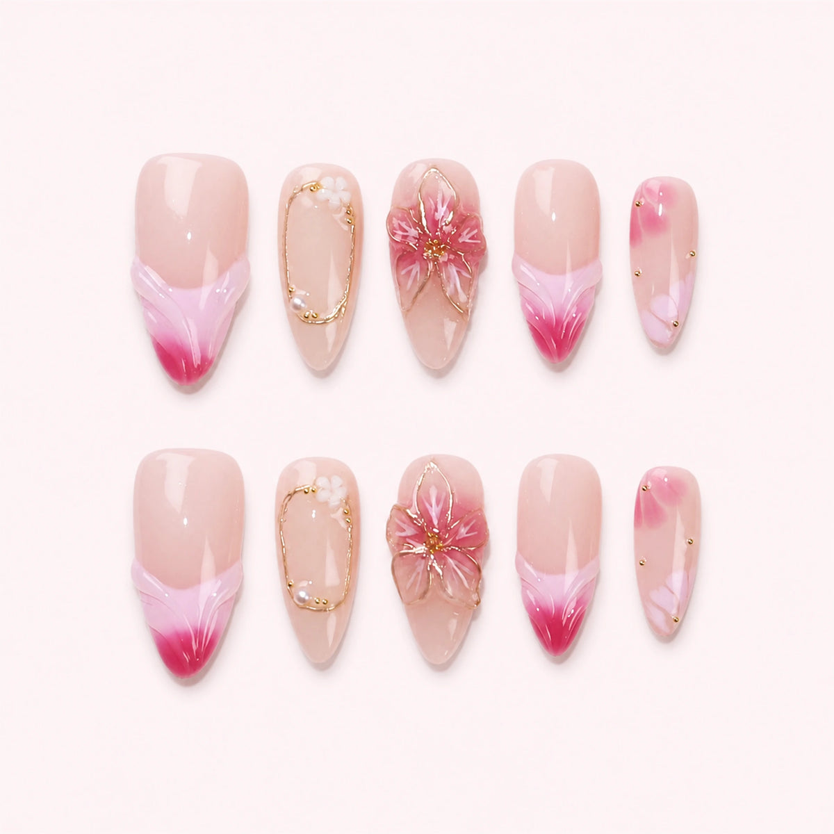 Rose Drift press-on nails, full ten-piece set on a pale blush-white background