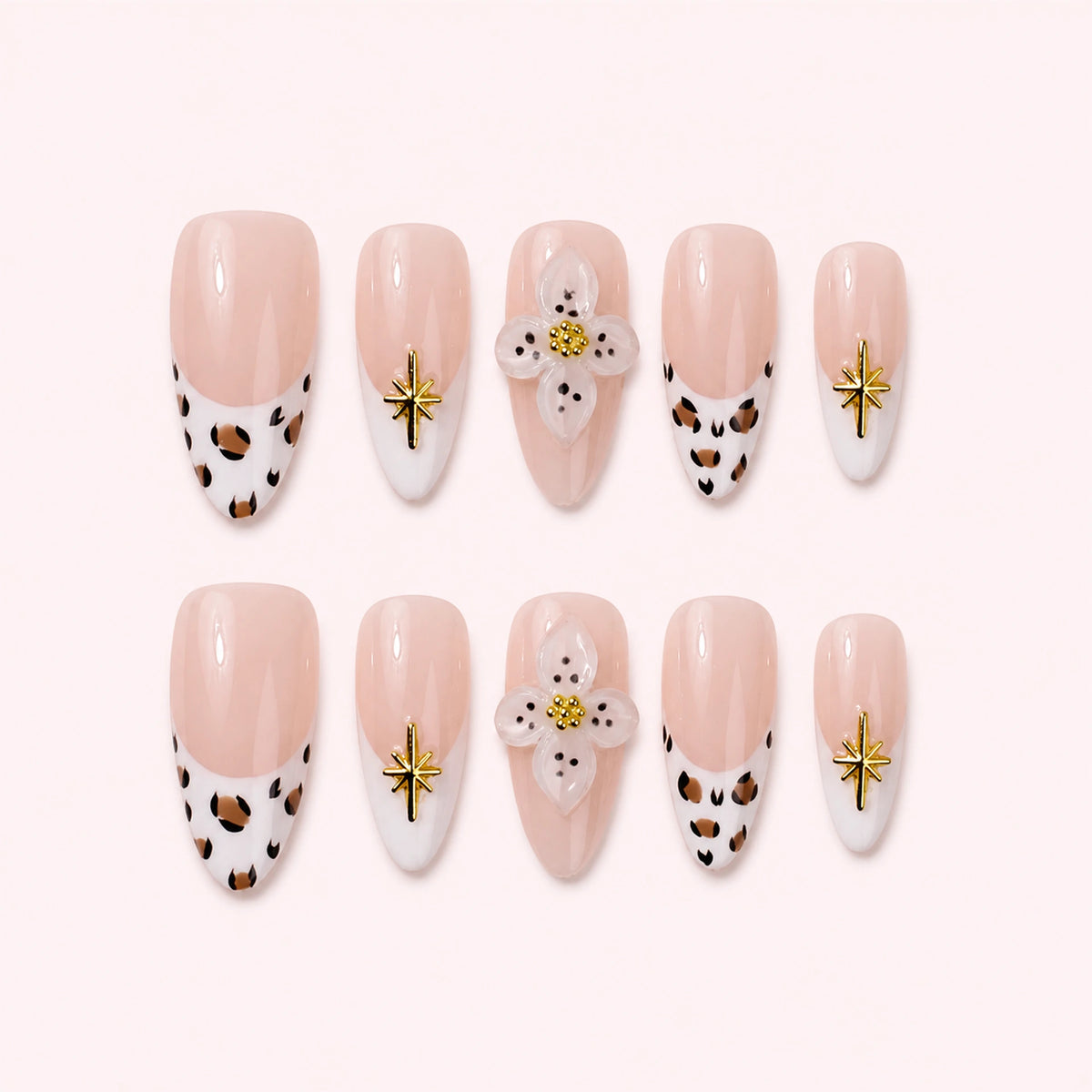 Wildflower Safari press-on nails, full ten-piece set on a pale blush-white background
