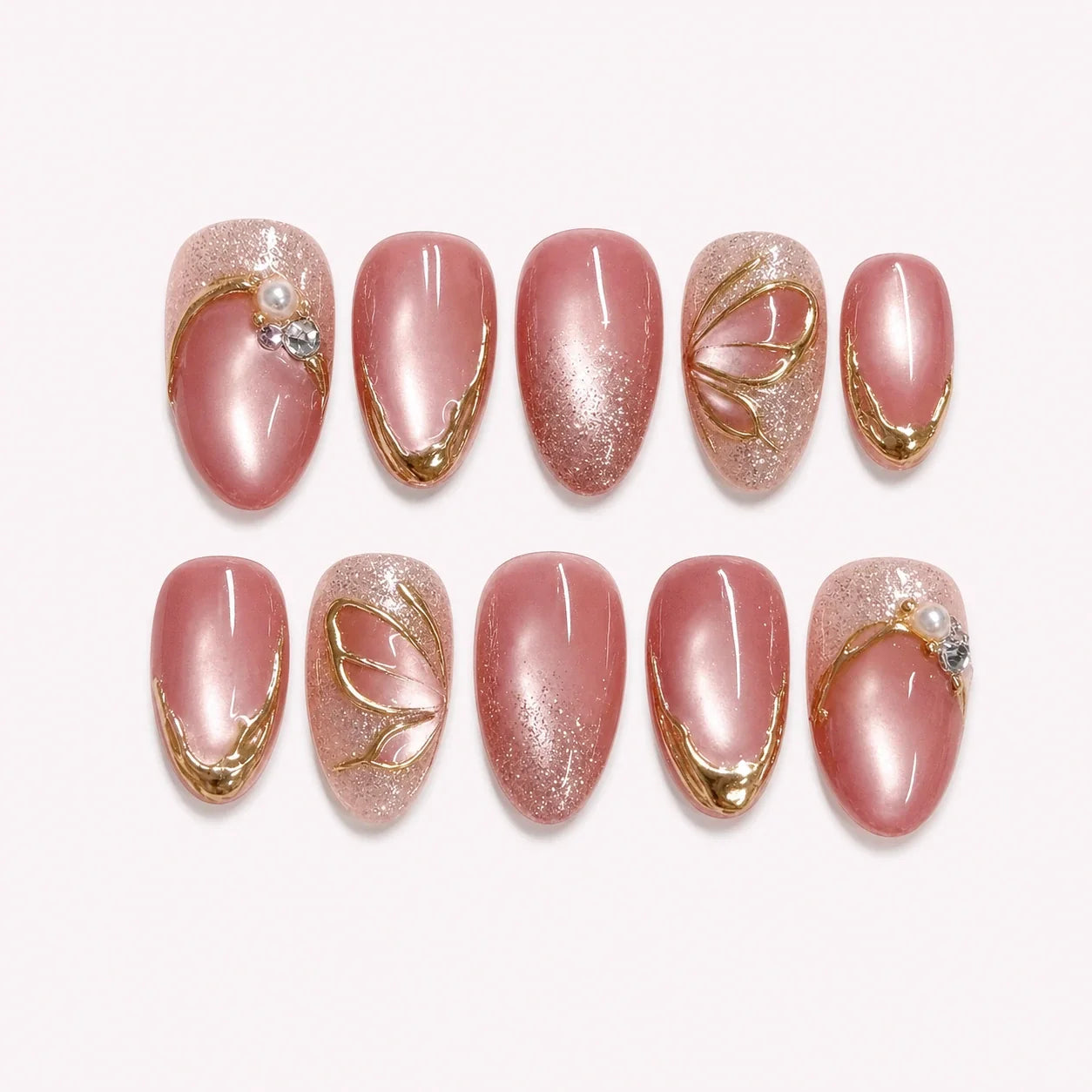 Mauve Monarch dusty rose cat-eye medium almond press-on nails product display