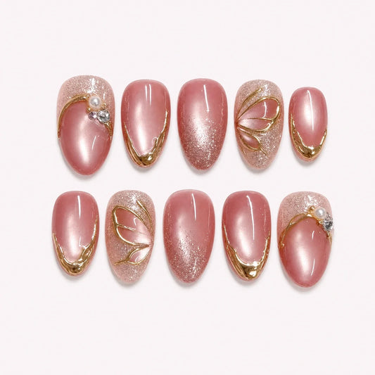 Mauve Monarch dusty rose cat-eye medium almond press-on nails product display