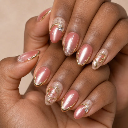Mauve Monarch dusty rose cat-eye medium almond press-on nails on two medium-brown hands