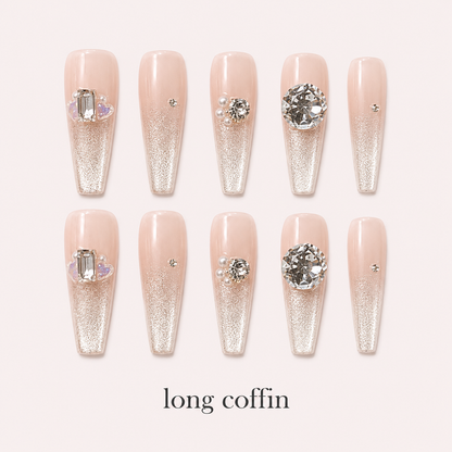 Moonlit Facet Long Coffin handmade press-on nails with nude pink cat-eye shimmer and silver crystals