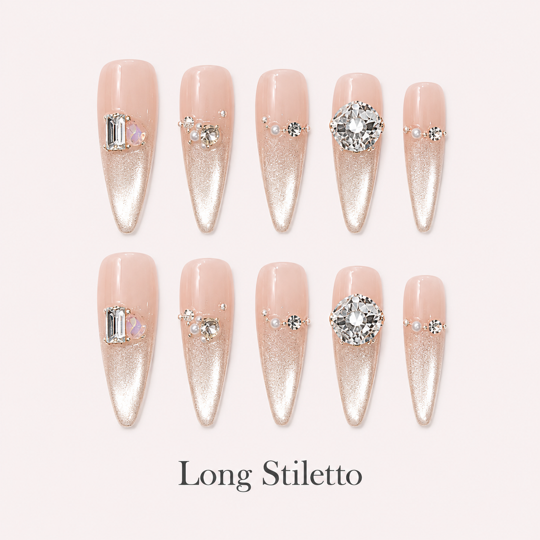 Moonlit Facet Long Stiletto handmade press-on nails with nude pink cat-eye shimmer and silver crystals