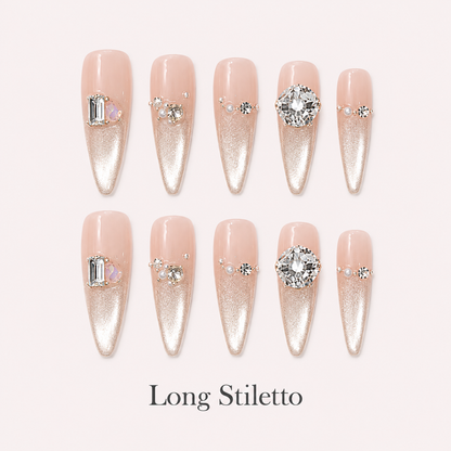 Moonlit Facet Long Stiletto handmade press-on nails with nude pink cat-eye shimmer and silver crystals