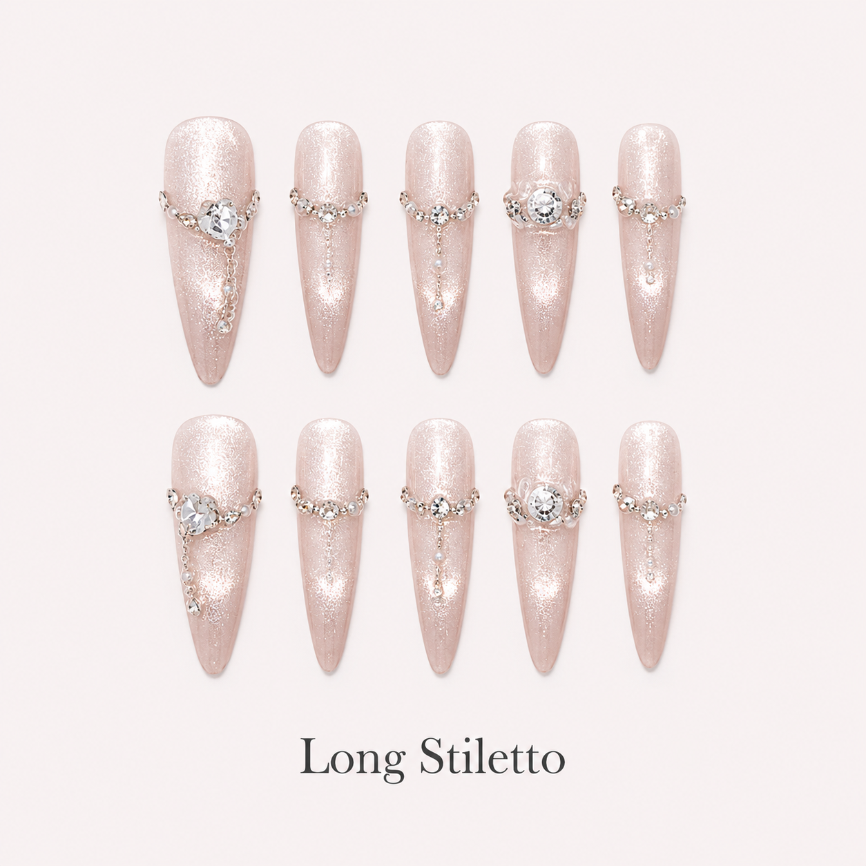 Moonlit Rosette Long Stiletto handmade press-on nails with champagne shimmer, chains and rose crystals
