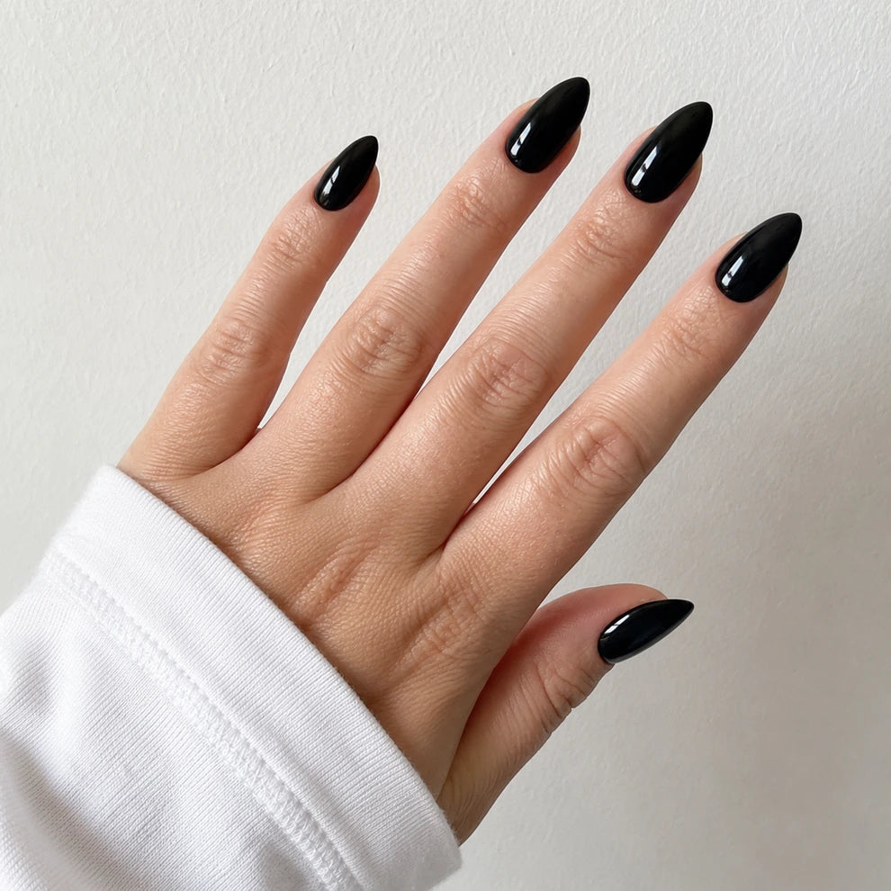 Patent Noir medium almond black press-on nails by Matchy Nails