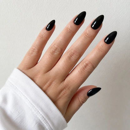 Patent Noir medium almond black press-on nails by Matchy Nails