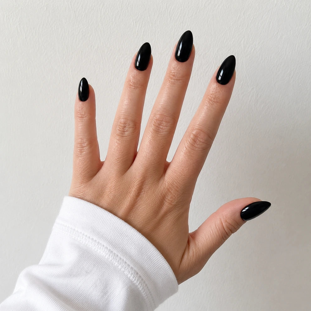 Patent Noir medium almond black press-on nails by Matchy Nails