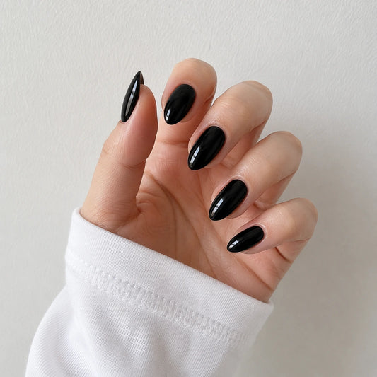 Patent Noir medium almond black press-on nails by Matchy Nails