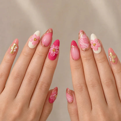 Petal Regalia medium almond press-on nails on two open hands