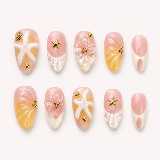 Pink Sand Souvenir oval press-on nails in blush, honey yellow and pearly white