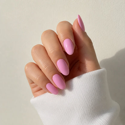 Pink Taffy medium almond press-on nails by Matchy Nails