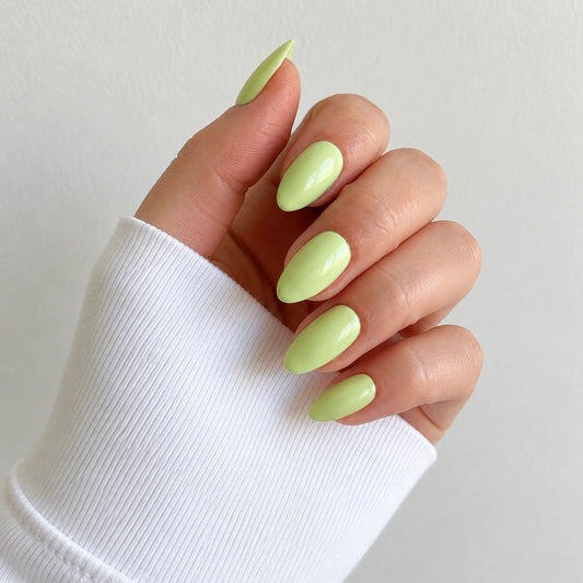 Pistachio Glaze medium almond press-on nails by Matchy Nails