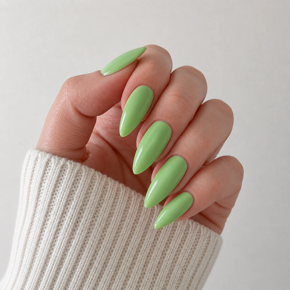 Pistachio Muse medium almond green press-on nails by Matchy Nails