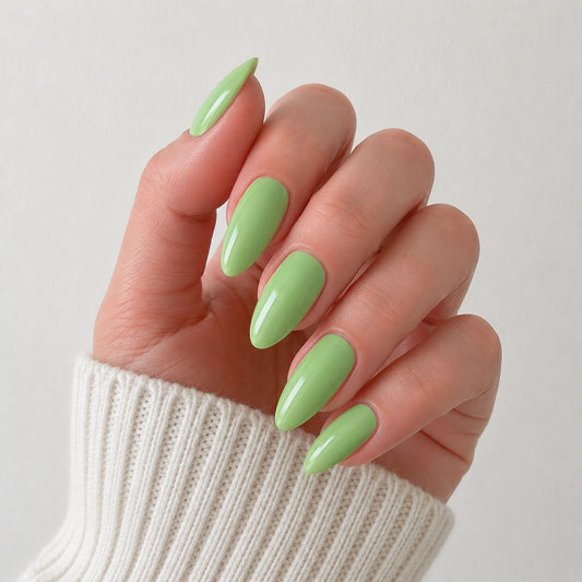 Pistachio Muse medium almond green press-on nails by Matchy Nails