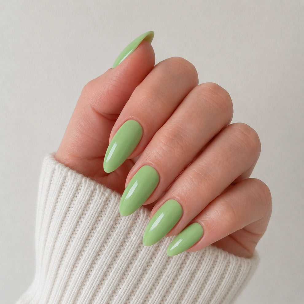 Pistachio Muse medium almond green press-on nails by Matchy Nails