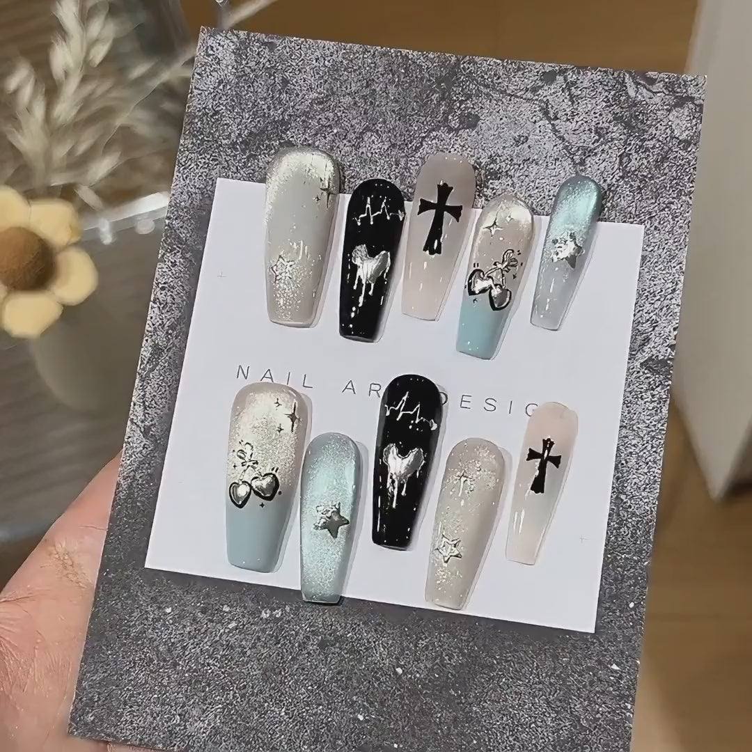 Mint Nocturne product video showing mint, black and silver handmade press-on nails