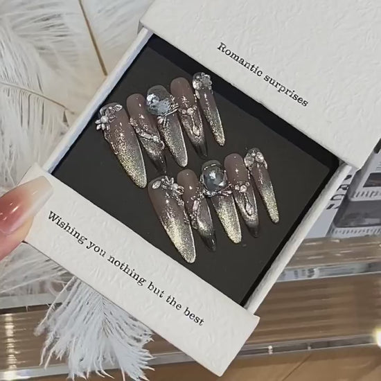 Smoky Diadem smoky grey press-on nails product video with silver glitter and crystal accents
