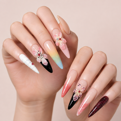Two softly crossed hands wearing Prism Bloom Long Stiletto floral press-on nails