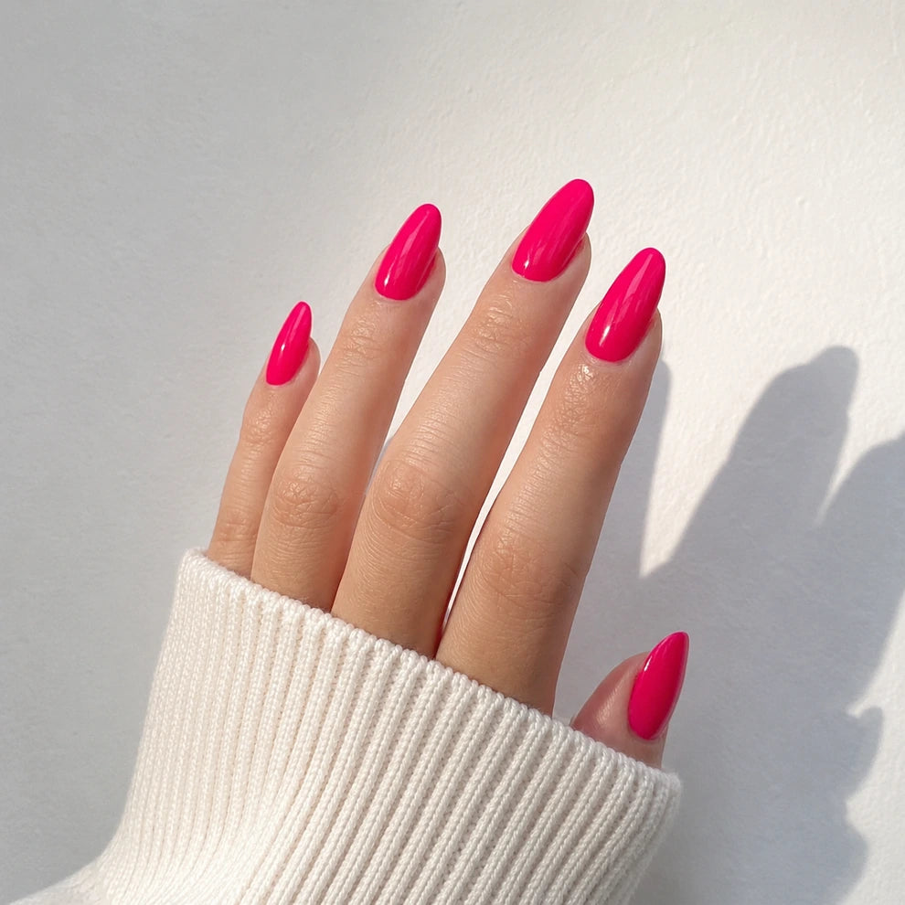 Raspberry Lacquer medium almond press-on nails by Matchy Nails