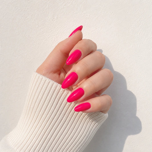 Raspberry Lacquer medium almond press-on nails by Matchy Nails