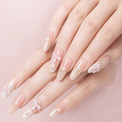 Two hands side by side wearing Ribbon Constellation Long Oval blush press-on nails